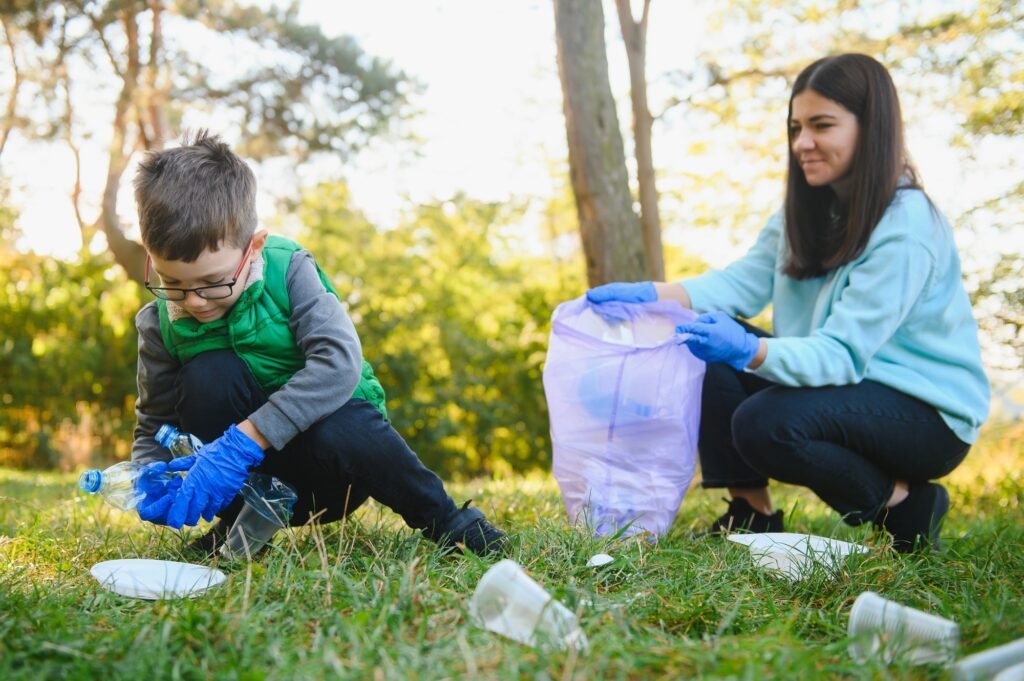 A woman removes plastic bottles in a bag. The topic of environmental pollution by garbage.